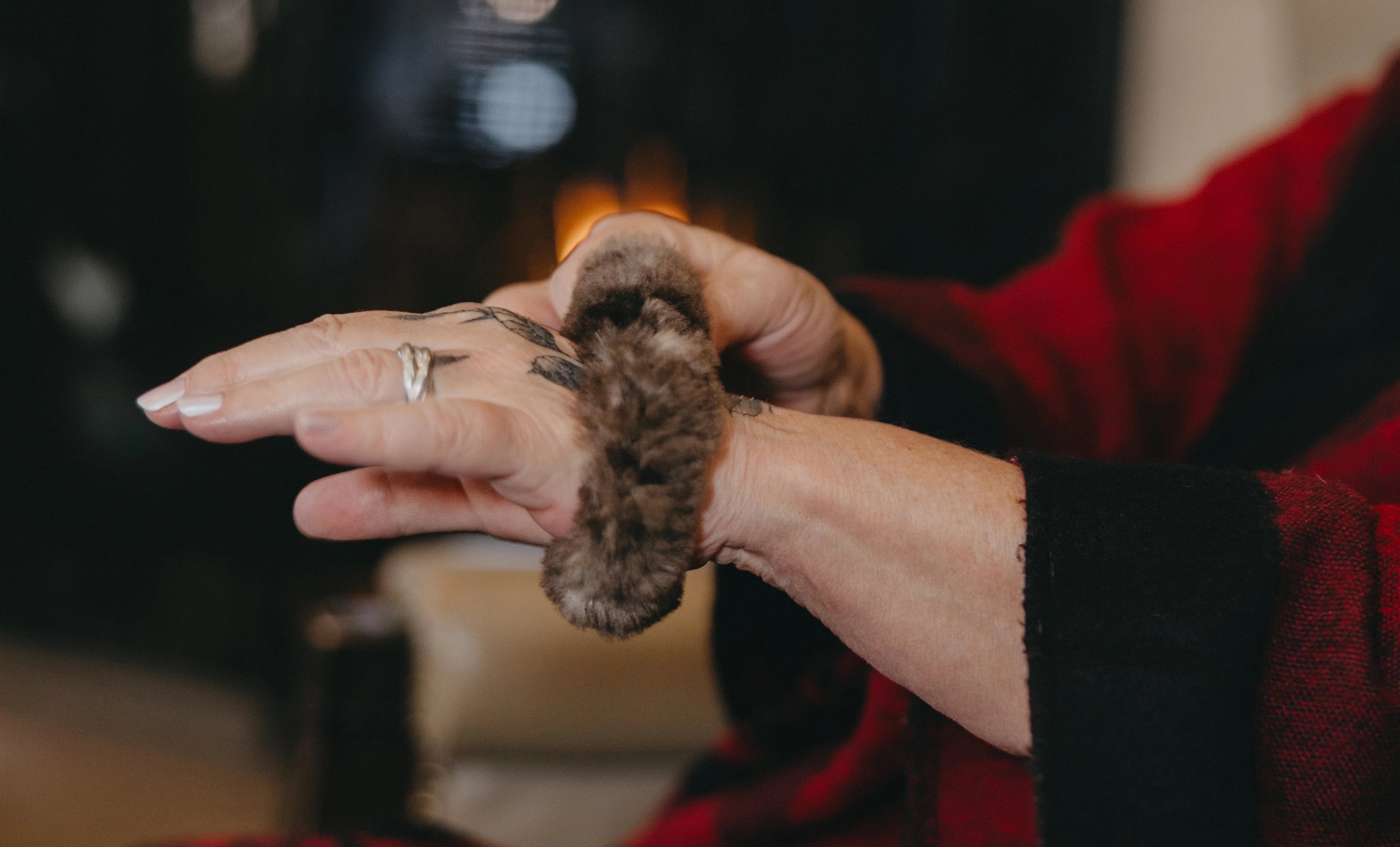 Beaver fur accessory on wrist - scrunchies for sale. Dene Fur Clouds Canada.